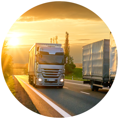 Circle with cargo trucks driving on highway